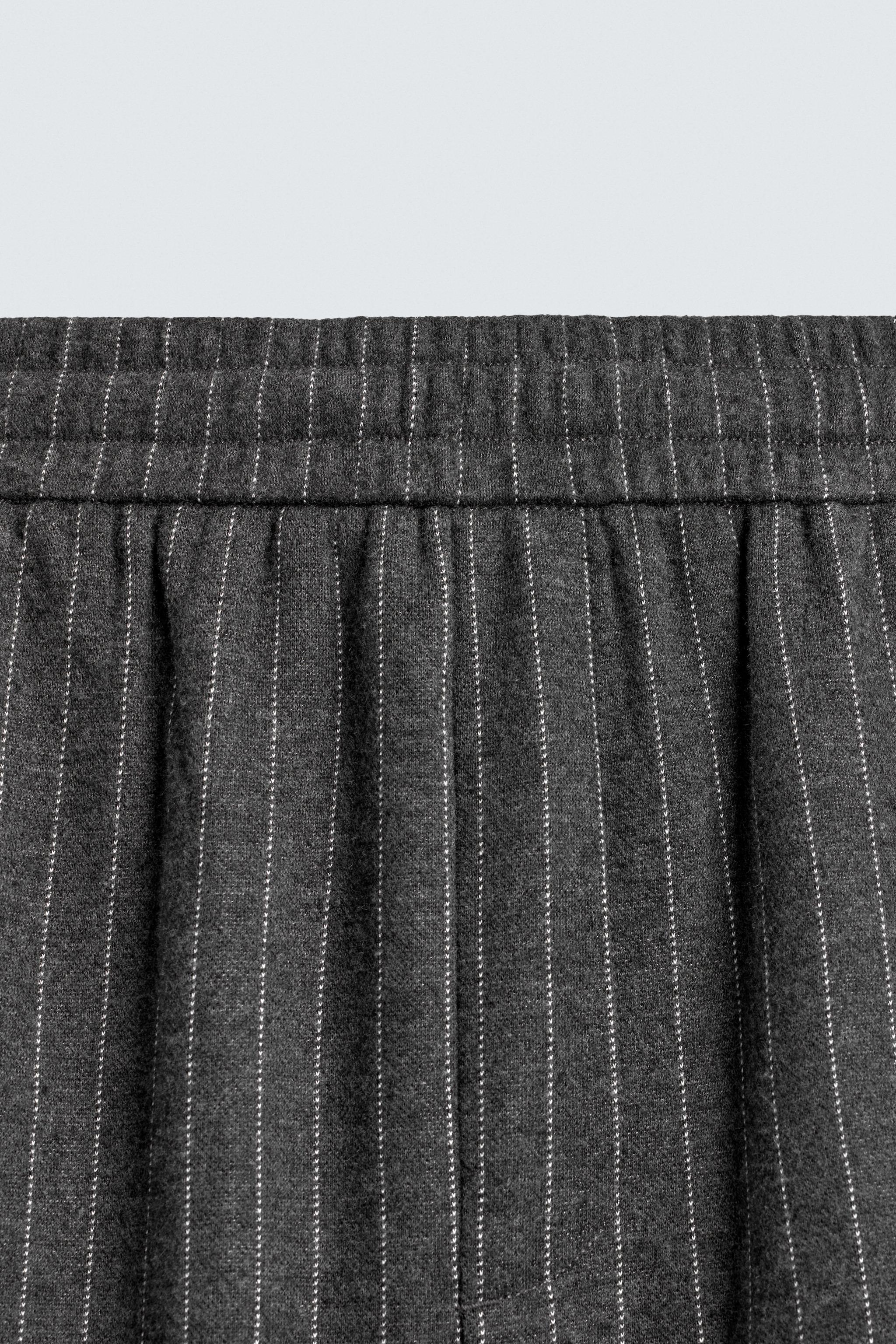 STRIPED BAGGY FIT PANTS